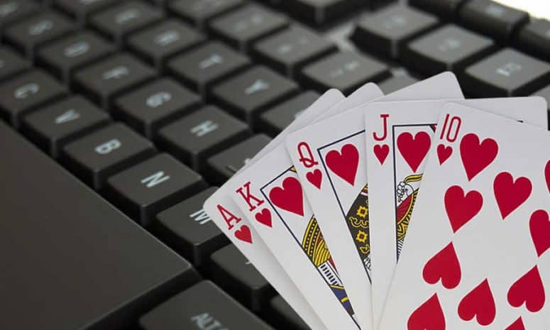 computer keyboard and playing cards